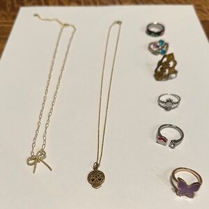 Elegant Gold Skull Pendant Necklace and Assorted Ring Set